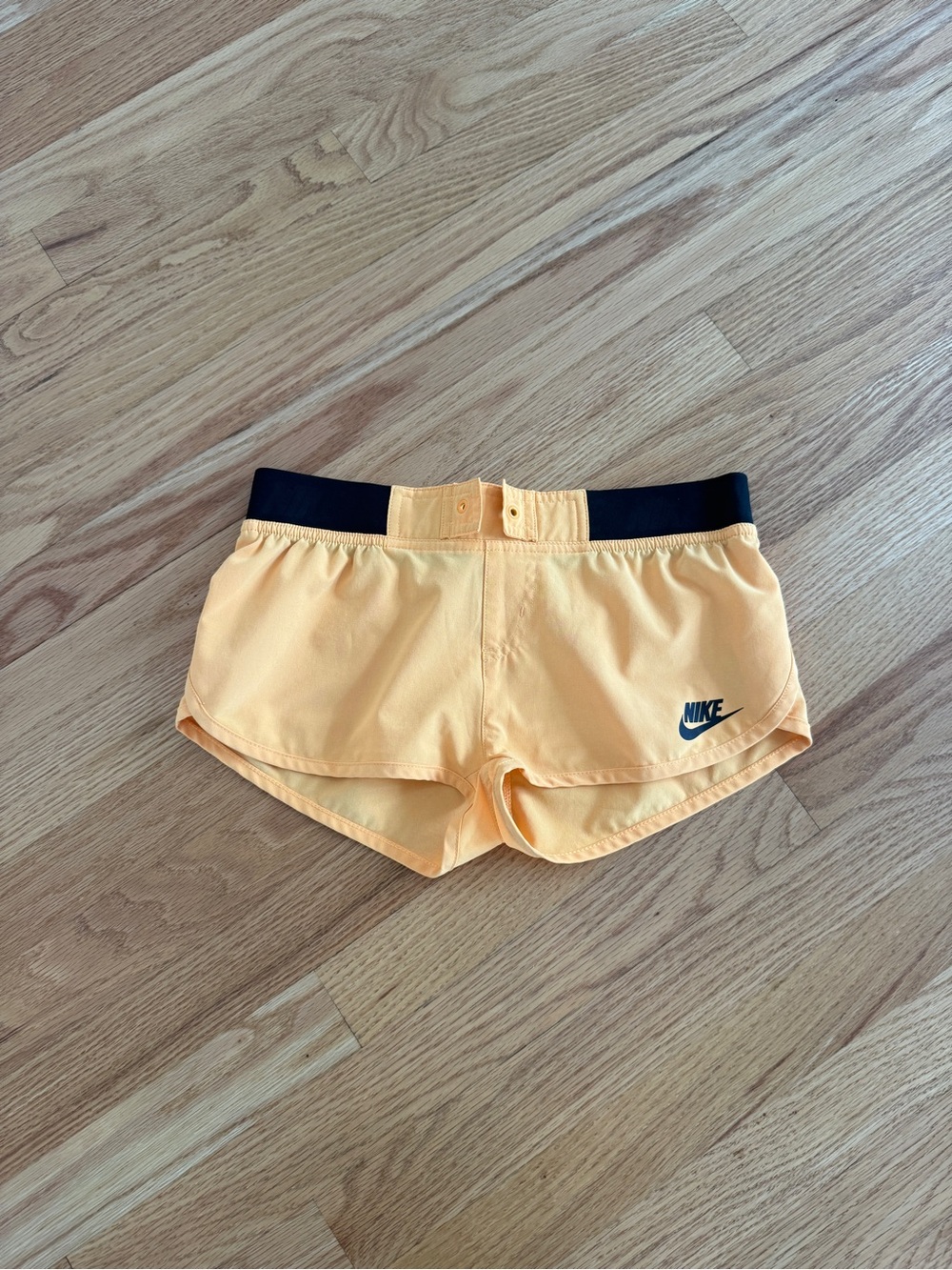 Nike orange mini shorts